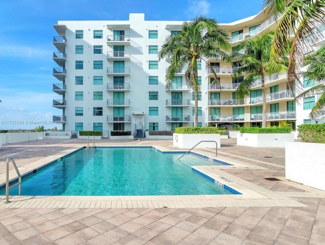 view of pool with a patio