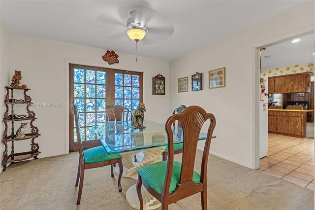 view of carpeted dining area