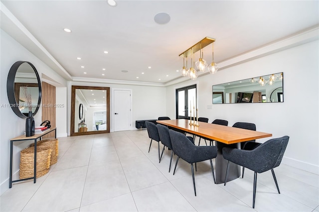 tiled dining space featuring french doors