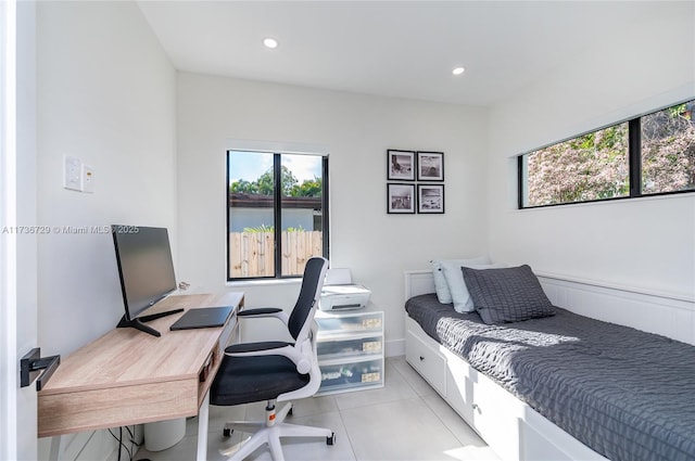 bedroom featuring light tile patterned floors