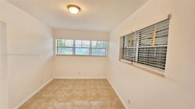 view of tiled empty room