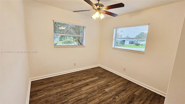 unfurnished room featuring dark wood-type flooring and ceiling fan