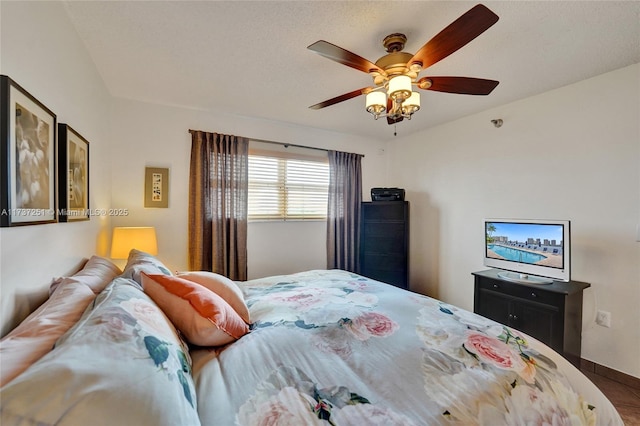 bedroom featuring ceiling fan