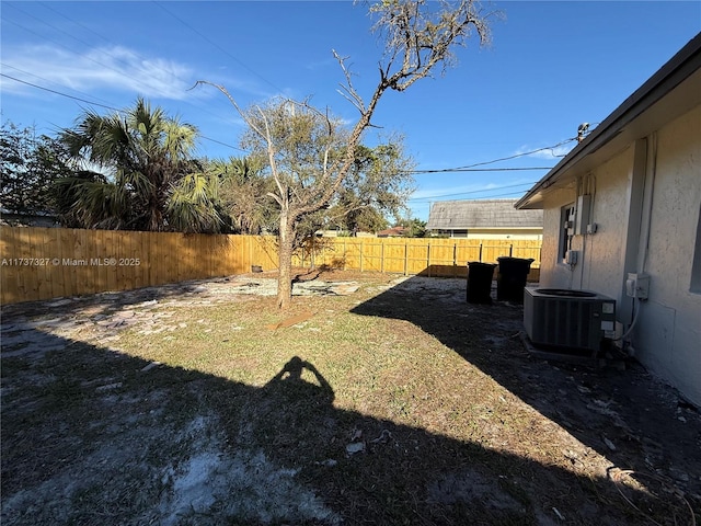 view of yard featuring central AC