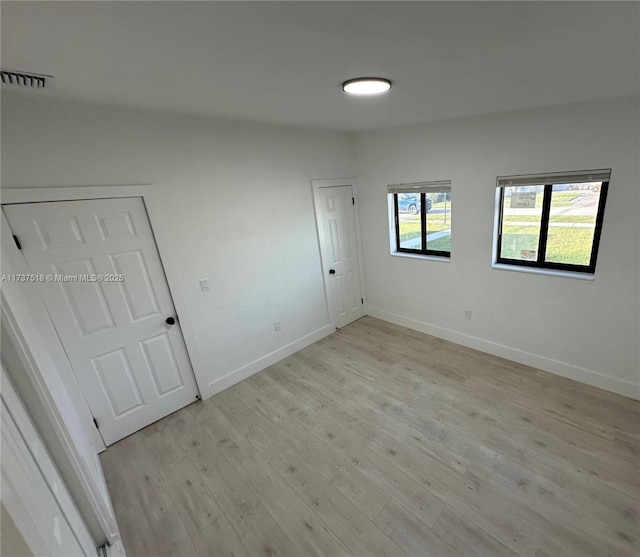 860 NW 171st St, Miami Gardens, FL 33169 - empty room featuring light hardwood / wood-style floors