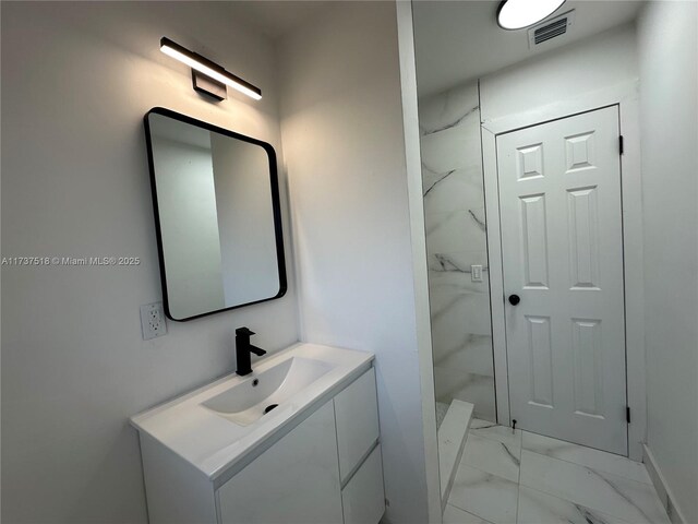 860 NW 171st St, Miami Gardens, FL 33169 - bathroom featuring vanity and walk in shower