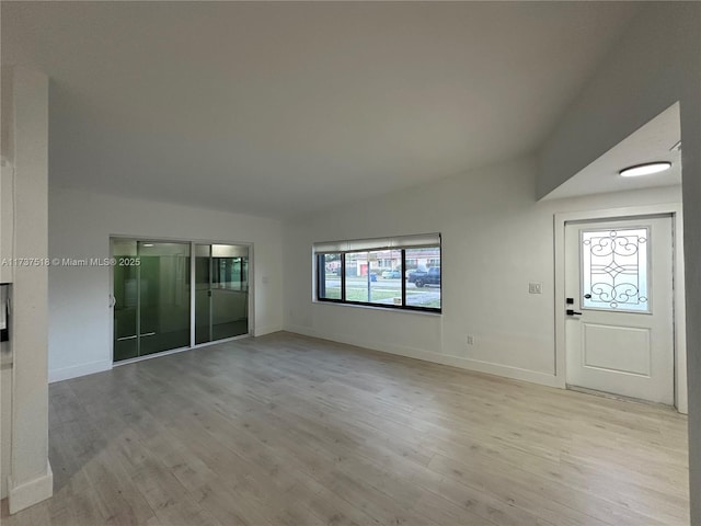 860 NW 171st St, Miami Gardens, FL 33169 - interior space featuring lofted ceiling and light wood-type flooring