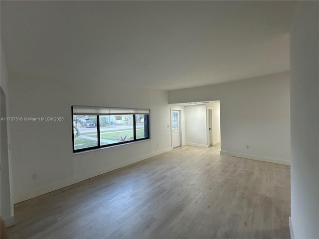 860 NW 171st St, Miami Gardens, FL 33169 - empty room featuring light wood-type flooring