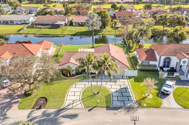 drone / aerial view featuring a water view