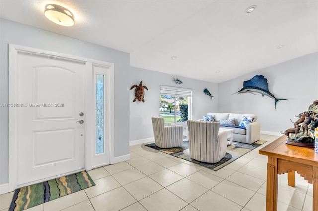 entrance foyer with light tile patterned flooring