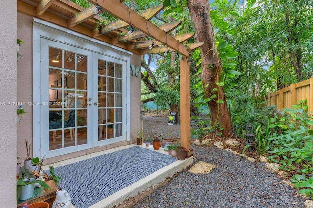 view of patio / terrace with french doors and a pergola