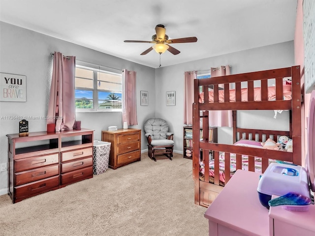 bedroom with ceiling fan and light colored carpet