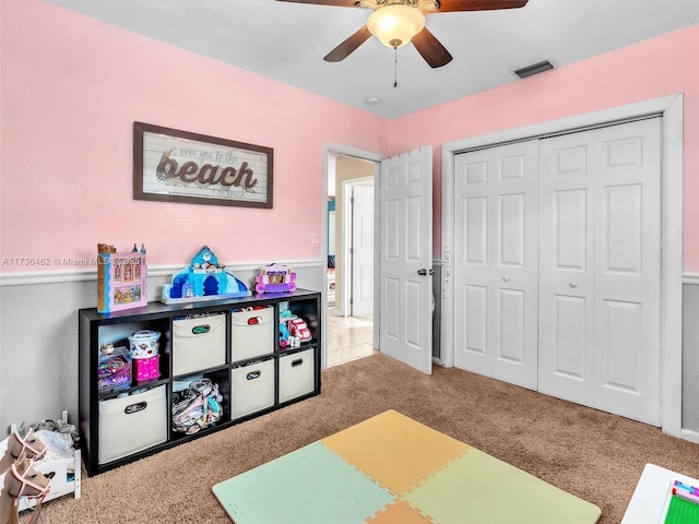 game room featuring carpet floors and ceiling fan