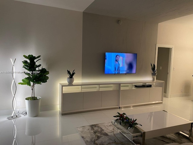 living room with light tile patterned floors