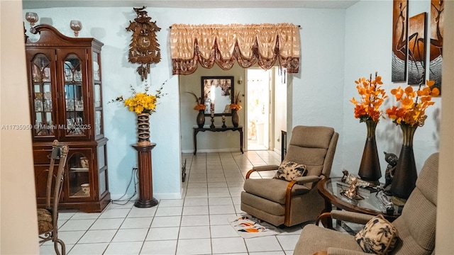 living area featuring light tile patterned floors