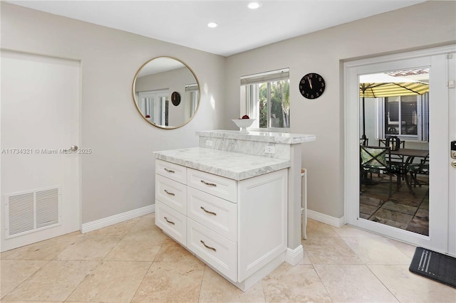 interior space with tile patterned flooring