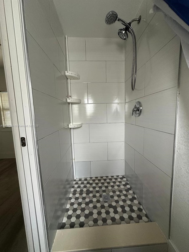 bathroom featuring a stall shower