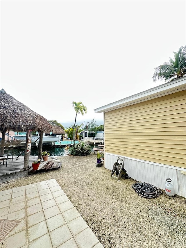 exterior space with gravel driveway