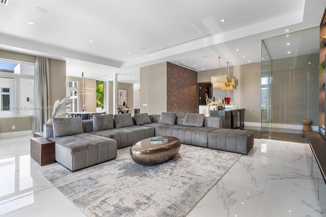 living room with a notable chandelier