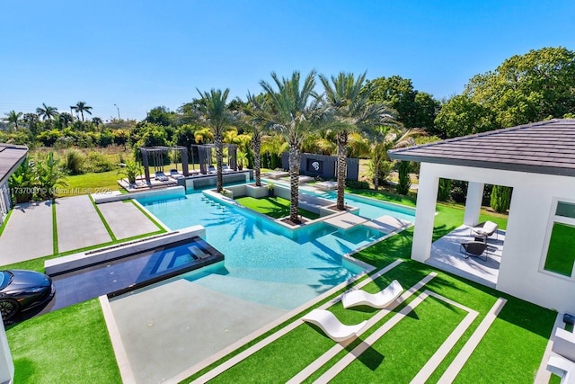 view of swimming pool with an in ground hot tub, a yard, and a patio area