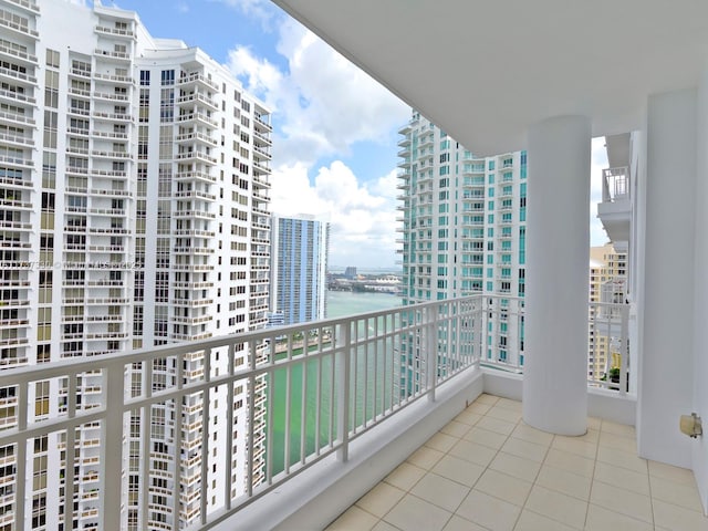 balcony featuring a water view