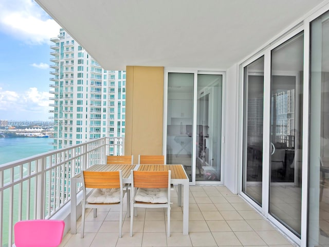 balcony featuring a water view