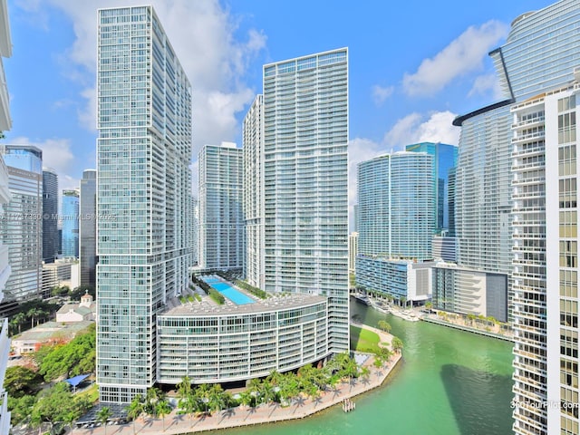 property's view of city with a water view