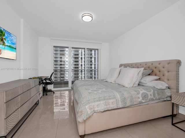 bedroom featuring light tile patterned flooring