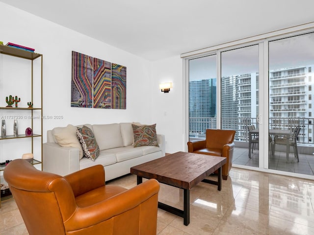 tiled living room with floor to ceiling windows