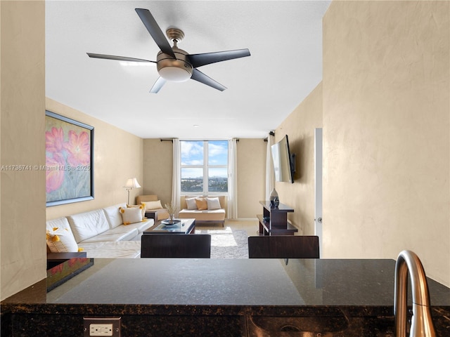 living room with ceiling fan