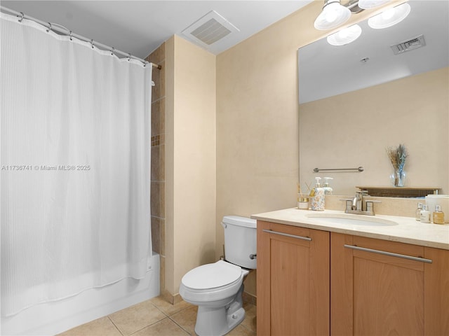 full bathroom with shower / bath combo with shower curtain, tile patterned floors, toilet, and vanity