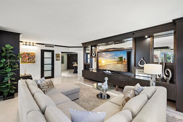 dining area featuring crown molding and a chandelier