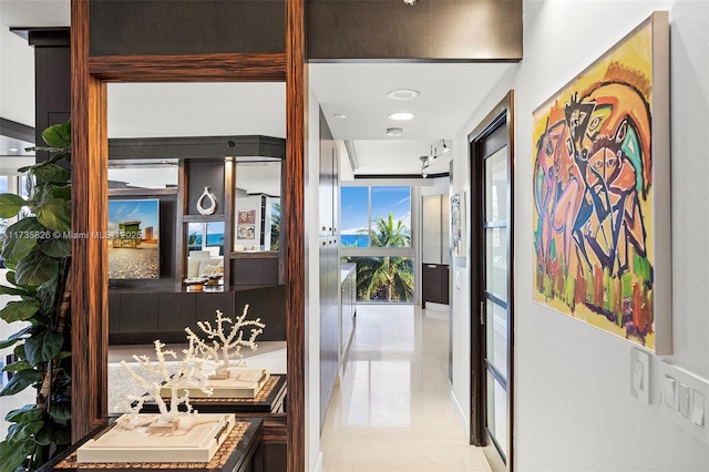 4775 Collins Ave Unit 501, Miami Beach, FL 33140 - hall with light tile patterned floors