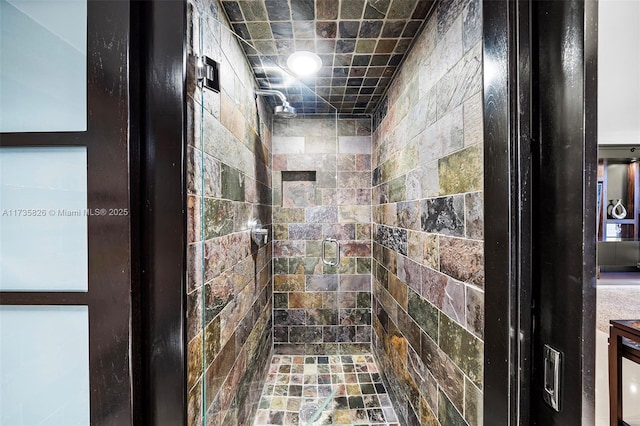 bathroom featuring an enclosed shower