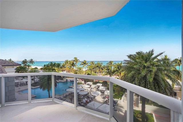 balcony featuring a water view