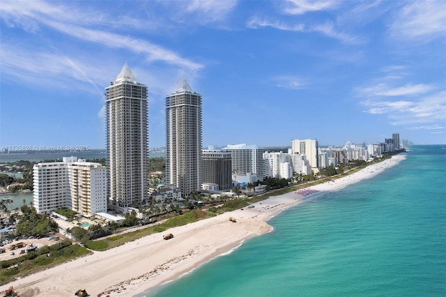 drone / aerial view with a view of the beach and a water view