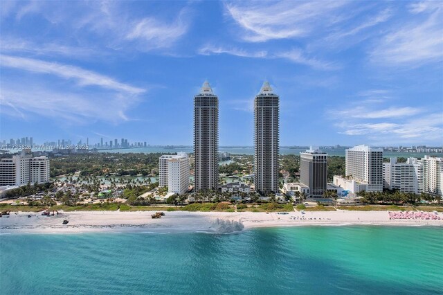 4775 Collins Ave Unit 501, Miami Beach, FL 33140 - bird's eye view of skyline and waterfront with a beach