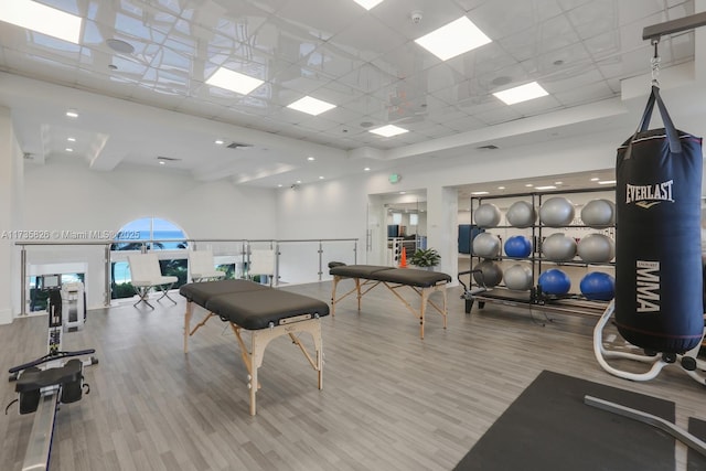 4775 Collins Ave Unit 501, Miami Beach, FL 33140 - playroom with wood finished floors, a high ceiling, and a drop ceiling
