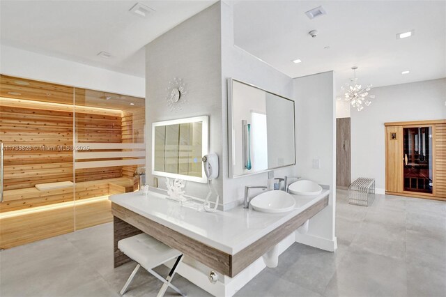 4775 Collins Ave Unit 501, Miami Beach, FL 33140 - full bath featuring double vanity, a chandelier, and concrete flooring