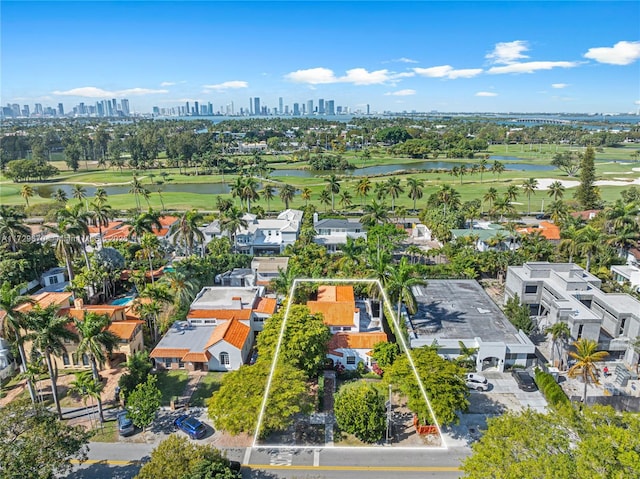 2424 Prairie Ave, Miami Beach, FL 33140 - aerial overview of property's location featuring property parcel outlined, a large body of water, a golf course, and a skyline view