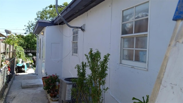 view of property exterior with cooling unit