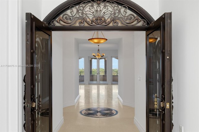 foyer entrance featuring french doors