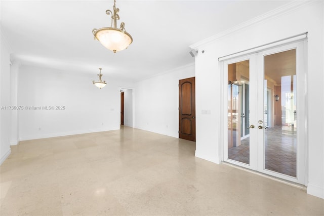 unfurnished room featuring crown molding and french doors