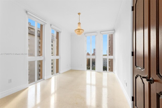 spare room with ornamental molding