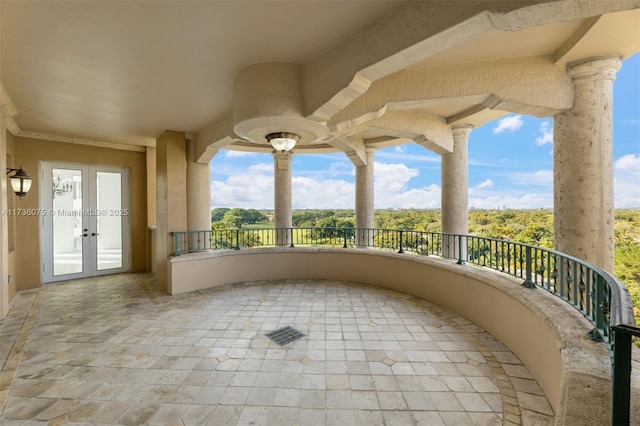 balcony featuring french doors