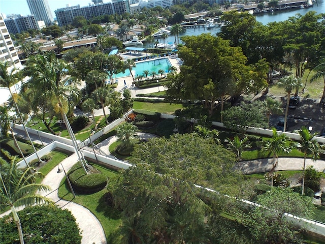 birds eye view of property with a water view