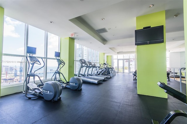 exercise room with expansive windows