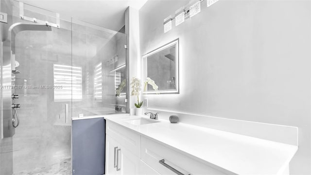 full bath featuring a shower stall and vanity