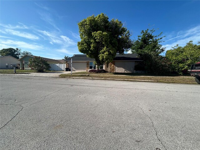 7403 Foxbloom Dr, New Port Richey, FL 34668 - view of front of house with driveway