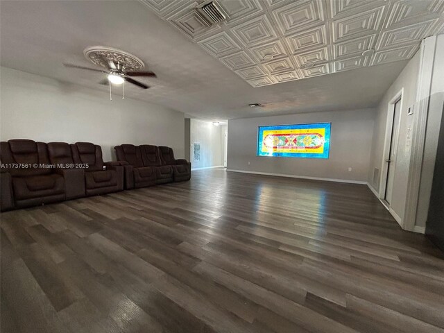 7403 Foxbloom Dr, New Port Richey, FL 34668 - living area with a ceiling fan, wood finished floors, and baseboards